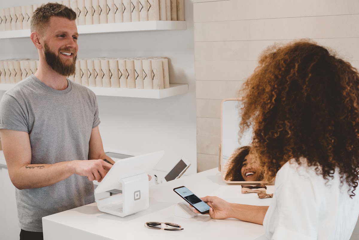 Customer using retail checkout payment technology